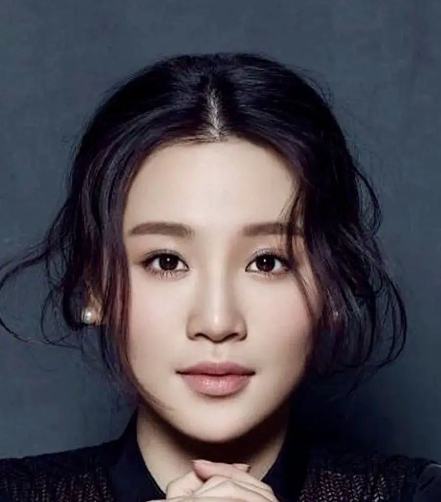بیوگرافی Zhou Xue Fei